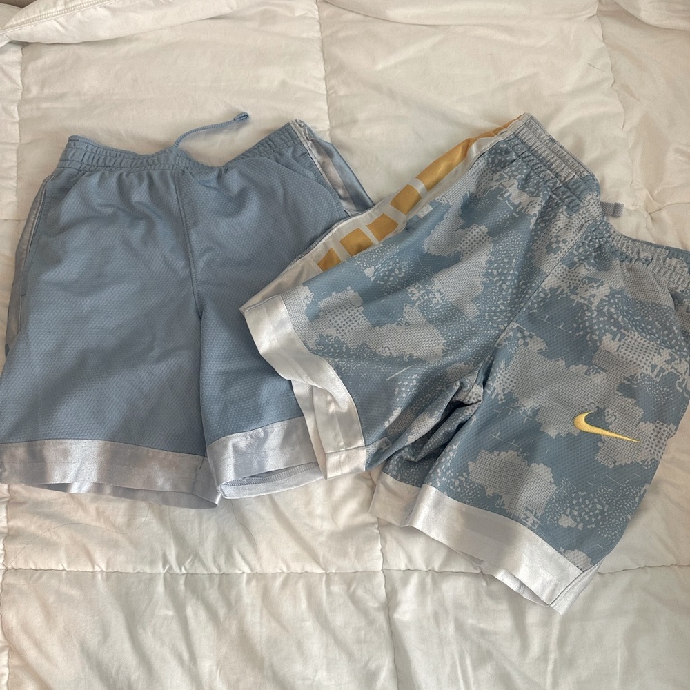 Boys youth Nike basketball shorts.  Size large. Selling the two together